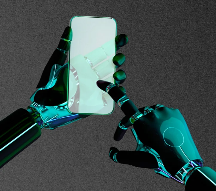 Robot hands using a smartphone.