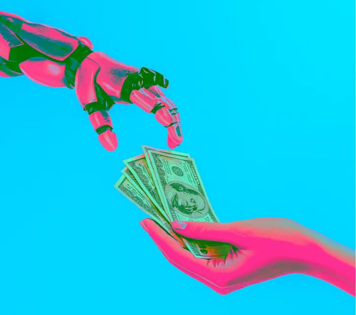 A human hand offering up cash to a robot hand.