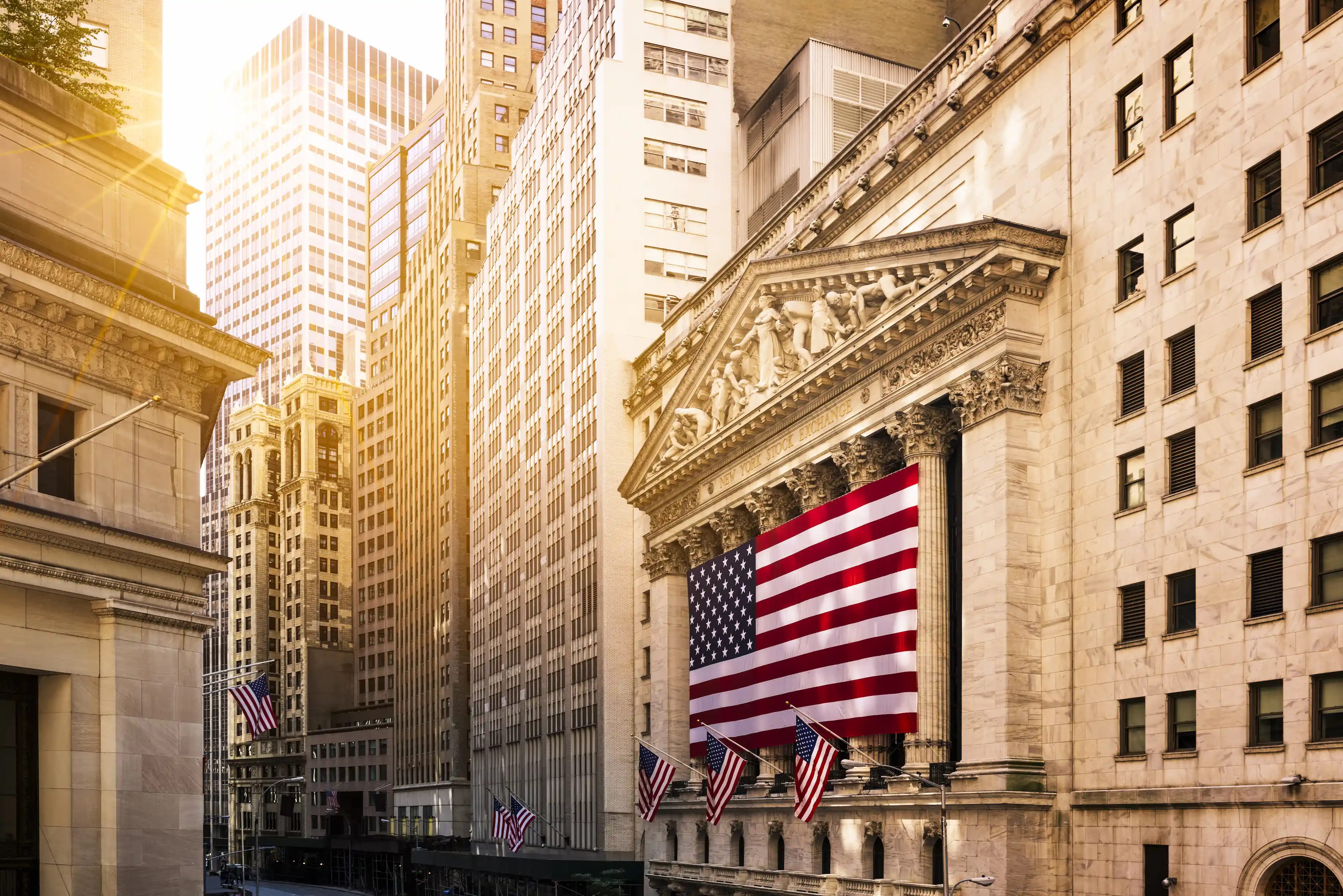 New York Stock Exchange building with American flags